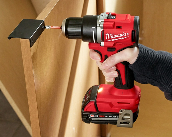 Milwaukee M18 Cordless Drill 2601 Driving Screws into Cabinet